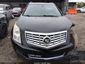 2015 Cadillac SRX — photo 12 of 16 | VIN 3GYFNEE34FS623211