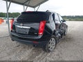 2013 Cadillac SRX — photo 4 of 16 | VIN 3GYFNCE30DS609470