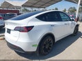 2023 Tesla Model Y — photo 4 of 17 | VIN 7SAYGDEE8PA106055