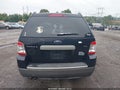 2008 Ford Taurus — photo 16 of 18 | VIN 1FMDK02W38GA37409