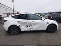 2025 Tesla Model Y — photo 12 of 15 | VIN 7SAYGDEE2SF251216