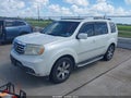 2014 Honda Pilot — photo 2 of 16 | VIN 5FNYF3H99EB018611