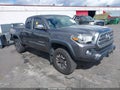 2016 Toyota Tacoma — photo 1 of 12 | VIN 5TFSZ5AN4GX012935