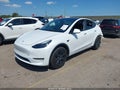2025 Tesla Model Y — photo 2 of 17 | VIN 7SAYGDED5SA359690
