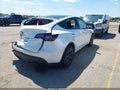 2025 Tesla Model Y — photo 4 of 17 | VIN 7SAYGDED5SA359690