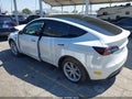 2022 Tesla Model Y — photo 3 of 15 | VIN 7SAYGDEE0NF353733