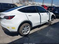 2022 Tesla Model Y — photo 4 of 15 | VIN 7SAYGDEE0NF353733