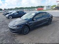 2024 Tesla Model 3 — photo 2 of 15 | VIN 5YJ3E1EA7RF833685