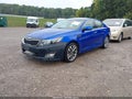 2015 Kia Optima — photo 2 of 11 | VIN 5XXGR4A79FG459610