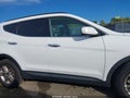 2017 Hyundai Santa Fe — photo 13 of 16 | VIN 5NMZUDLB0HH014007
