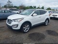 2014 Hyundai Santa Fe — photo 2 of 11 | VIN 5XYZW3LA7EG180865