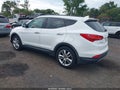 2014 Hyundai Santa Fe — photo 3 of 11 | VIN 5XYZW3LA7EG180865