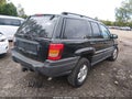 2004 Jeep Grand Cherokee — photo 4 of 16 | VIN 1J4GW48SX4C380103