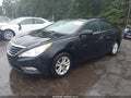 2013 Hyundai Sonata — photo 2 of 16 | VIN 5NPEB4ACXDH592841
