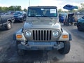 2004 Jeep Wrangler — photo 12 of 17 | VIN 1J4FA69S64P798705