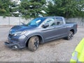 2020 Honda Ridgeline — photo 2 of 17 | VIN 5FPYK3F56LB017187