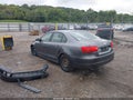 2012 Volkswagen Jetta — photo 3 of 17 | VIN 3VWDP7AJXCM073064