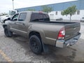 2014 Toyota Tacoma — photo 3 of 16 | VIN 5TFJX4GN1EX036786