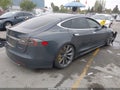 2014 Tesla Model S — photo 4 of 15 | VIN 5YJSA1H11EFP47902