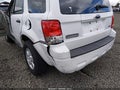 2009 Ford Escape — photo 17 of 17 | VIN 1FMCU93G59KC27406
