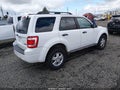 2009 Ford Escape — photo 4 of 17 | VIN 1FMCU93G59KC27406
