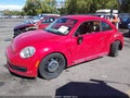 2014 Volkswagen Beetle — photo 2 of 16 | VIN 3VWJP7AT7EM605491