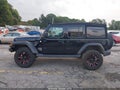 2018 Jeep Wrangler Unlimited — photo 14 of 16 | VIN 1C4HJXDG8JW165986