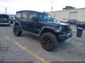 2018 Jeep Wrangler Unlimited — photo 1 of 16 | VIN 1C4HJXDG8JW165986