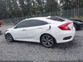 2020 Honda Civic — photo 14 of 18 | VIN 19XFC1F99LE206491