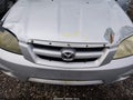 2005 Mazda Tribute — photo 10 of 11 | VIN 4F2CZ061X5KM03899