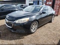 2015 Chevrolet Malibu — photo 2 of 11 | VIN 1G11C5SLXFF244043