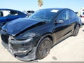 2026 Tesla Model Y — photo 2 of 15 | VIN 7SAYGDED0TA585542