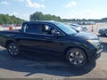 2018 Honda Ridgeline — photo 13 of 16 | VIN 5FPYK3F55JB005660