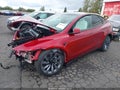 2026 Tesla Model Y — photo 2 of 20 | VIN 7SAYGAEE0TF703289