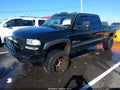 2002 GMC Sierra — photo 2 of 16 | VIN 1GTHK23122F197153
