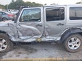 2014 Jeep Wrangler Unlimited — photo 6 of 16 | VIN 1C4HJWEG3EL198099