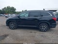 2022 Honda Pilot — photo 15 of 18 | VIN 5FNYF6H64NB012822