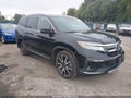 2022 Honda Pilot — photo 1 of 18 | VIN 5FNYF6H64NB012822