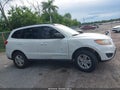 2010 Hyundai Santa Fe — photo 13 of 16 | VIN 5NMSG3AB7AH345243