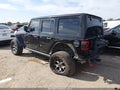 2019 Jeep Wrangler Unlimited — photo 3 of 18 | VIN 1C4HJXFN3KW657709