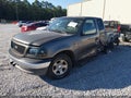 2002 Ford F-150 — photo 2 of 15 | VIN 1FTRX07W42KB60998