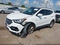 2017 Hyundai Santa Fe — photo 2 of 16 | VIN 5XYZU3LB7HG458490