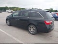2011 Honda Odyssey — photo 3 of 11 | VIN 5FNRL5H4XBB021994
