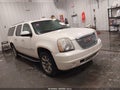 2009 GMC Yukon XL — photo 14 of 18 | VIN 1GKFK06279R209942