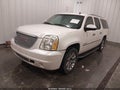 2009 GMC Yukon XL — photo 2 of 18 | VIN 1GKFK06279R209942