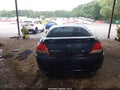 2005 Hyundai Tiburon — photo 15 of 15 | VIN KMHHN65F35U174242