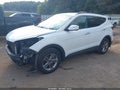 2018 Hyundai Santa Fe — photo 2 of 16 | VIN 5NMZU3LB0JH054698
