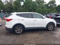 2013 Hyundai Santa Fe — photo 14 of 18 | VIN 5XYZT3LB5DG123418