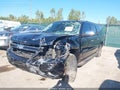 2009 Chevrolet Suburban 1500 — photo 2 of 16 | VIN 1GNFK363X9R280016