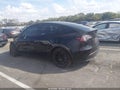 2021 Tesla Model Y — photo 13 of 17 | VIN 5YJYGAEE1MF304101